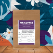 Load image into Gallery viewer, Seasonal Decaf freshly roasted specialty coffee — medium dark roast, dark chocolate, no caffeine, Canterbury roastery
